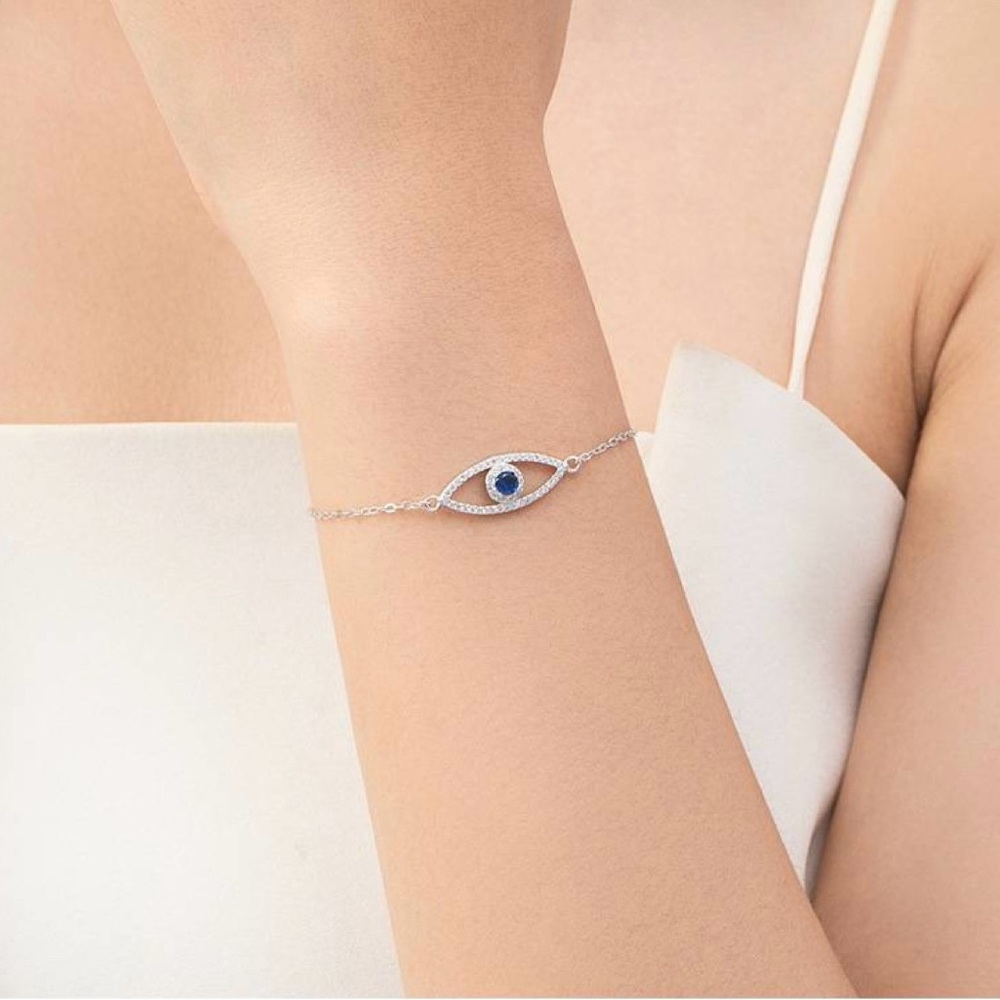 Sparkling Silver Eye Bracelet with Sapphire Blue Accent